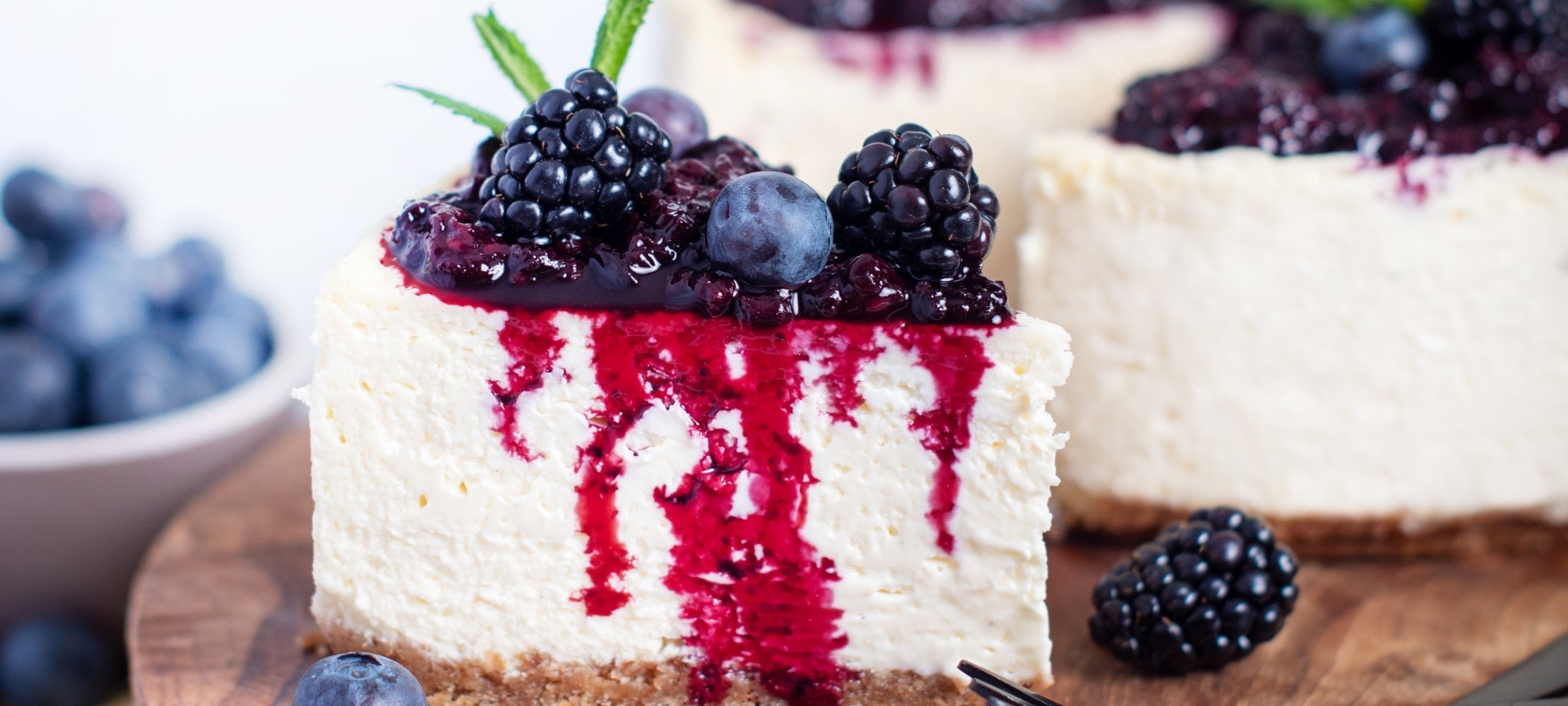 Vanilla Cheesecake with Berry Sauce